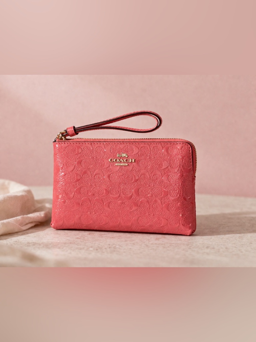 Coach Coral Pink Signature Patent Leather Wristlet